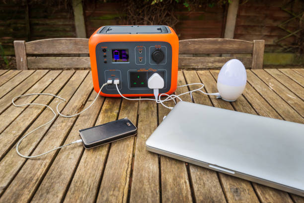 Solar panels and portable power station during sunset